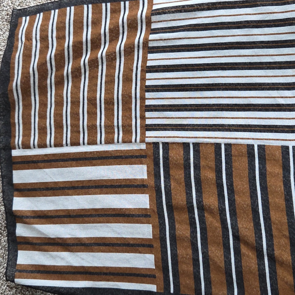This is a vintage Yves Saint Laurent 100% silk  19" Square Shades of Brown Scarf